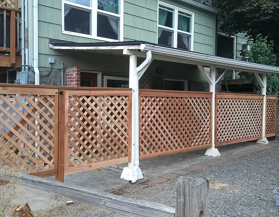 Lattice fence with wood frame