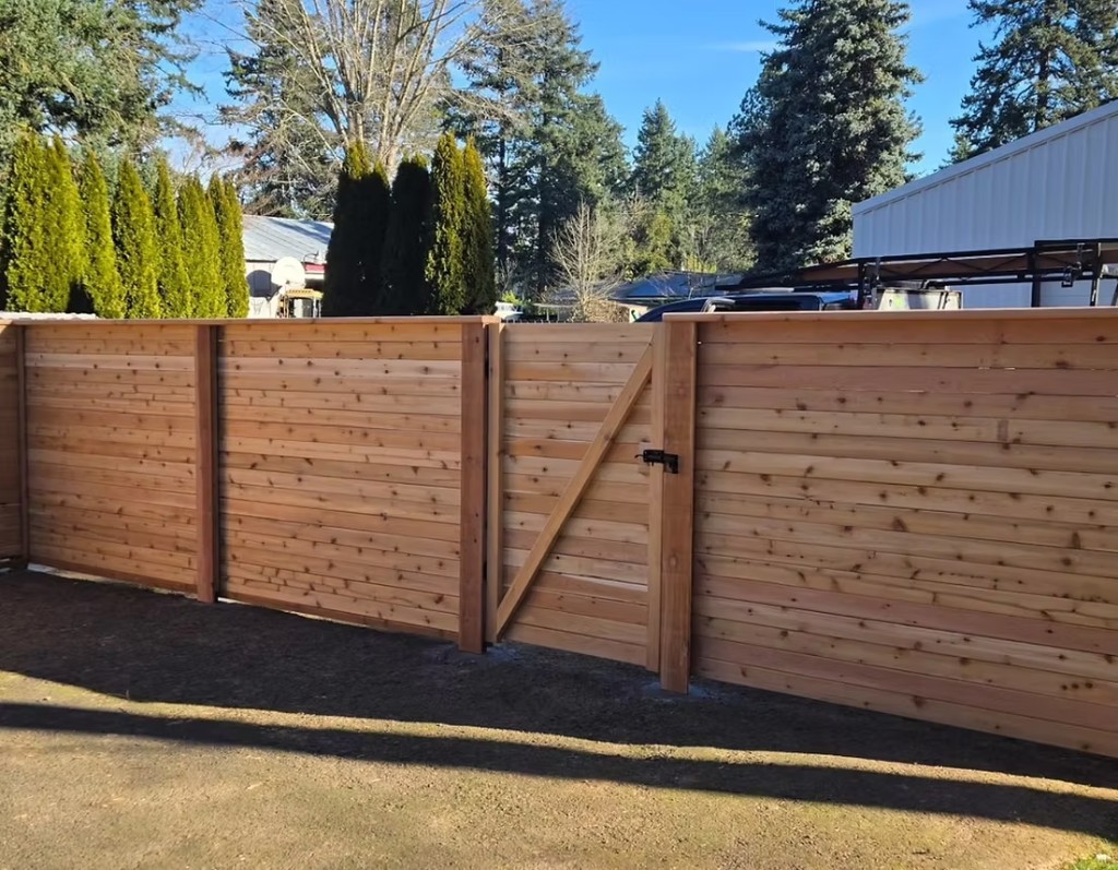 Cedar horizontal fence with drive gate